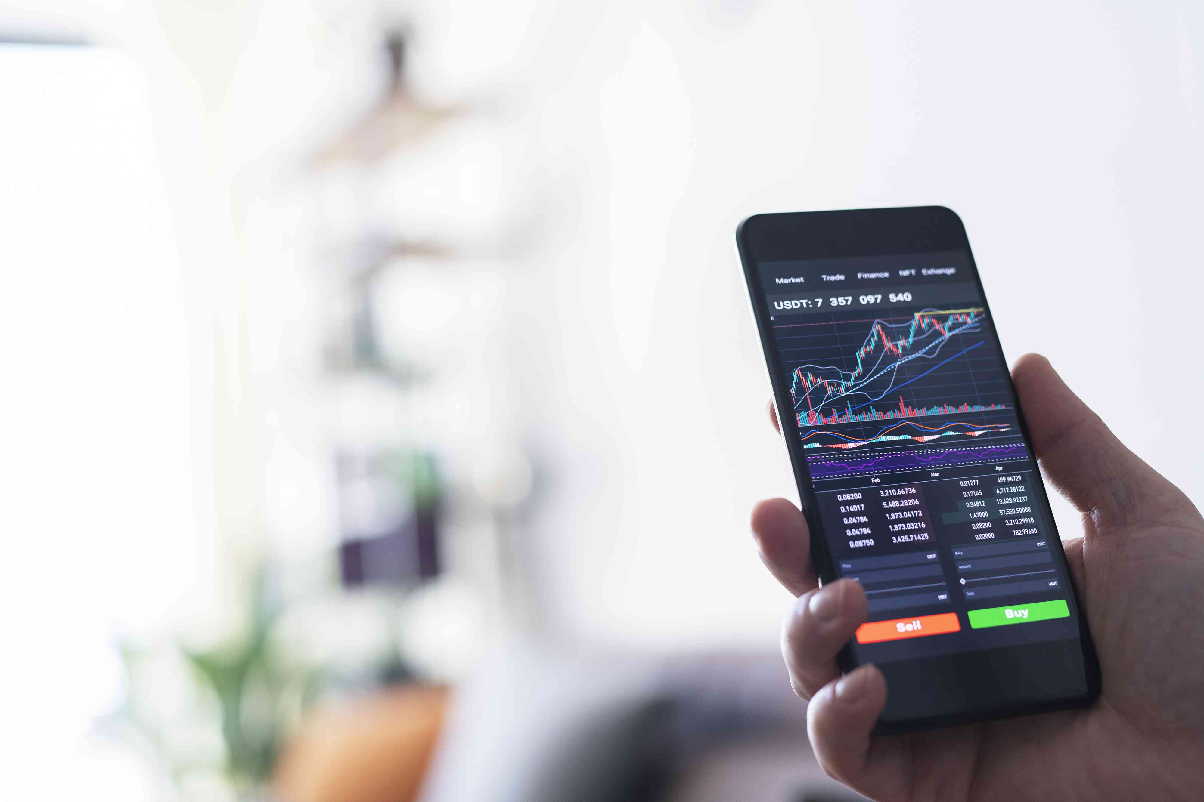 Businessman reading financial stock market analysis